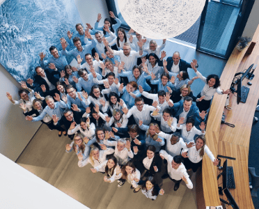 A bird's eye view of the Ille employees in the foyer